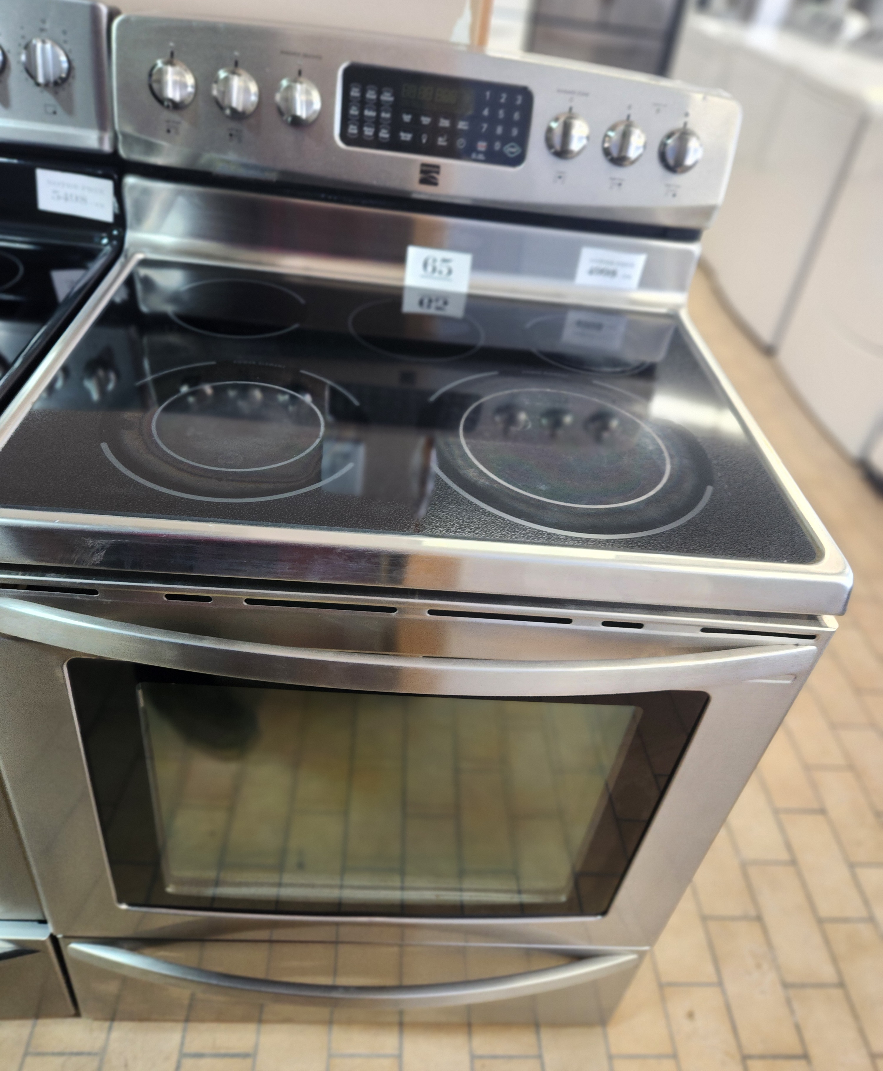 65- CUISINIERE INOX VITROCERAMIQUE